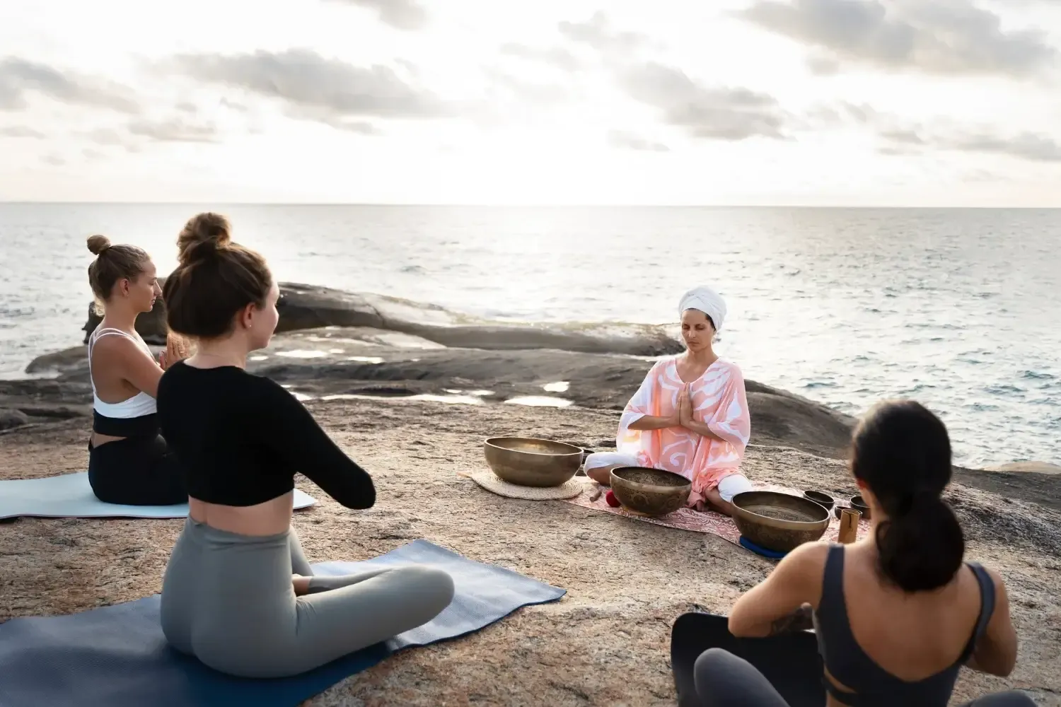 ancient healing environments, featuring wellness tourists and healthcare professionals